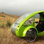 This cute little electric bike-car just may be back from the dead