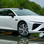 Neta S station wagon fully exposed as it enters China in August