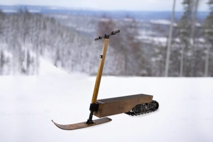 This wooden snow scooter is like a portable electric snowmobile that you stand on