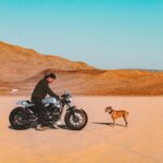 David Chang from Cafe Racers of Instagram on a Harley motorcycle riding on a salt flat