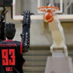 Watch Toyota’s robot set a new world record sinking an 80-foot basketball shot like it’s nothing