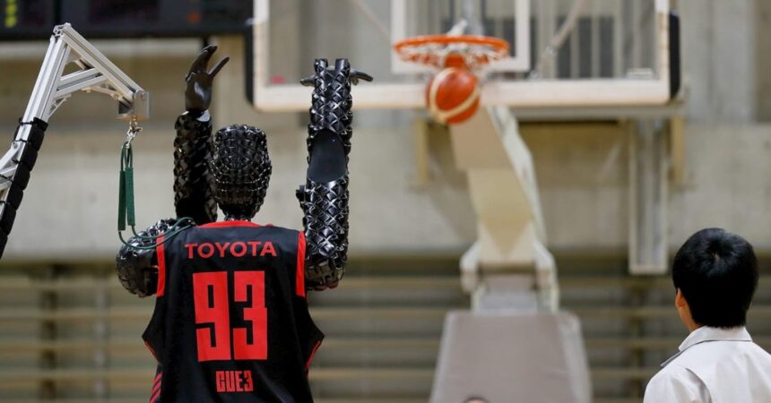 Watch Toyota’s robot set a new world record sinking an 80-foot basketball shot like it’s nothing