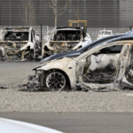 A dozen Tesla cars burned at store, arson is suspected amid global protests