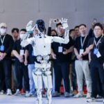 Xpeng showcases humanoid robot 'Iron' used for making its vehicles